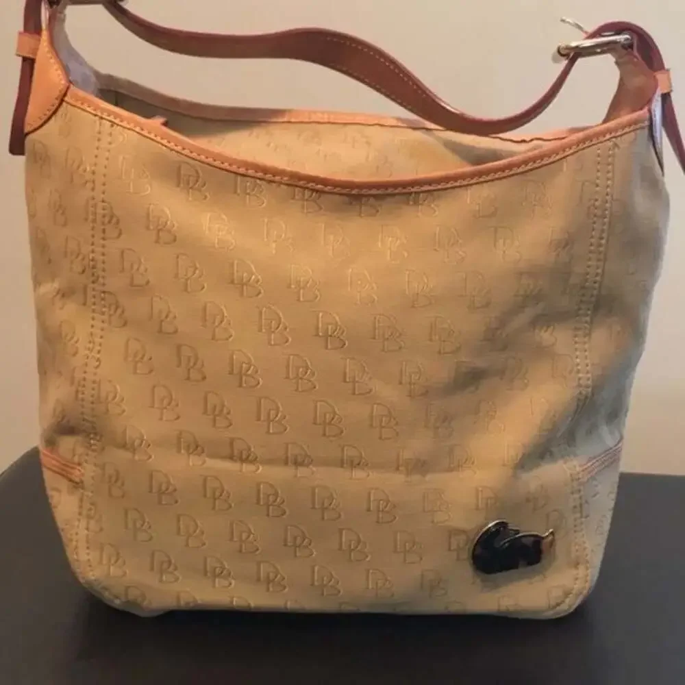 Vintage Y2K Dooney & Bourke tan and brown canvas signature hobo Shoulder Bag